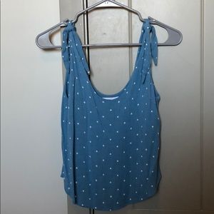 Blue shirt with white polka dots